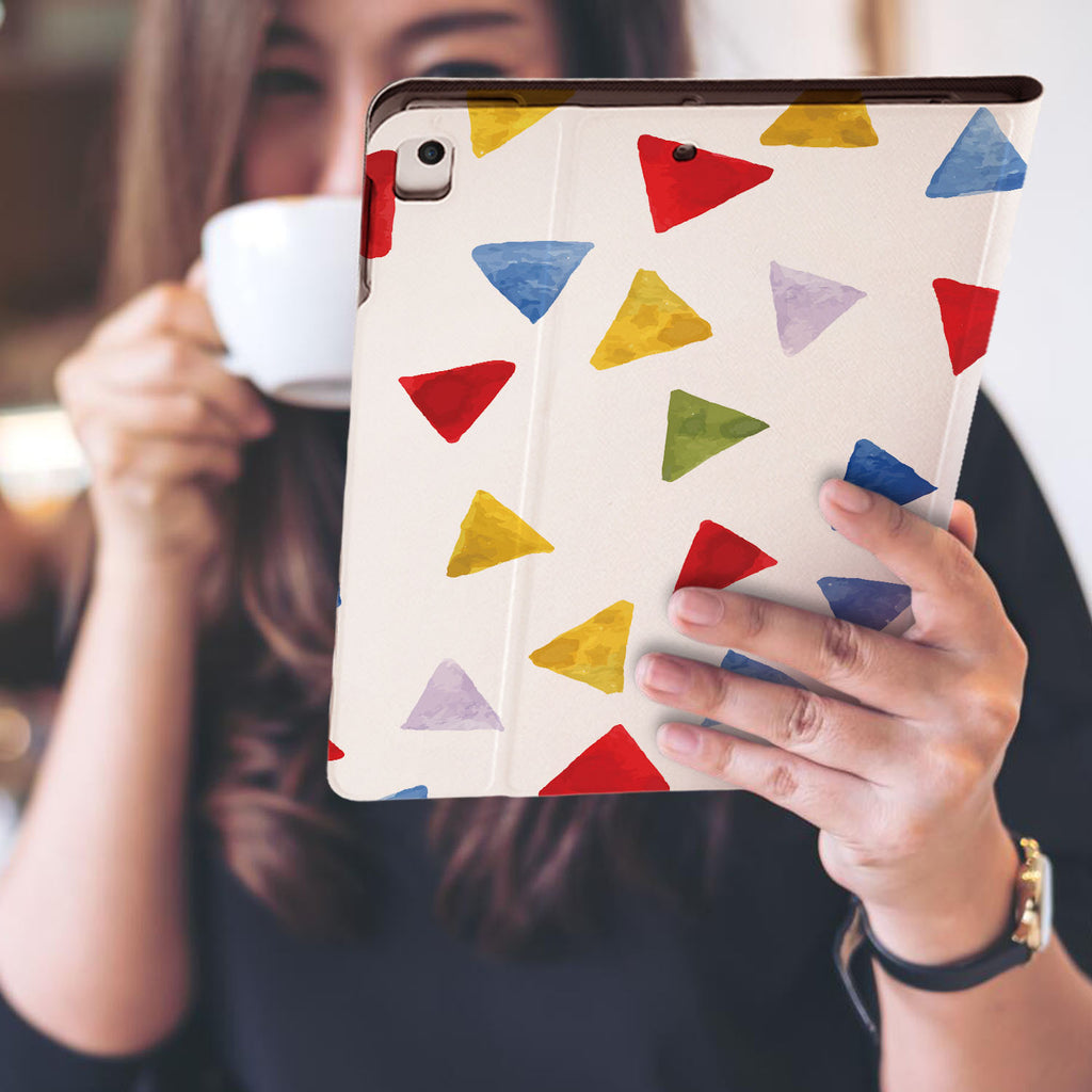 a girl is holding and viewing personalized iPad folio case with Geometry Pattern design