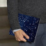 A business man holds Personalized VistaCase reMarkable Pen Holder Case with Galaxy Universe design